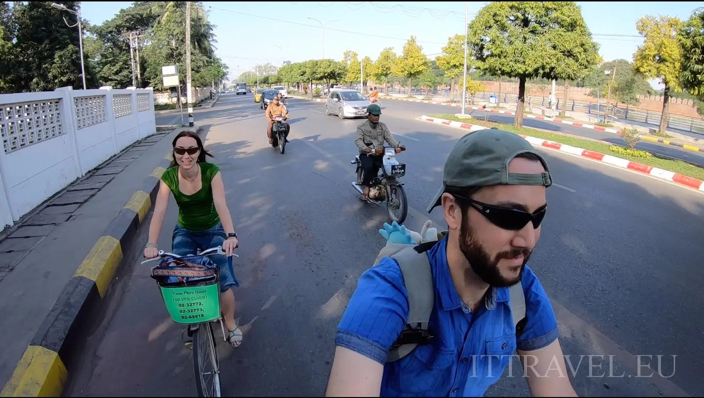 By bicycle between scooters.